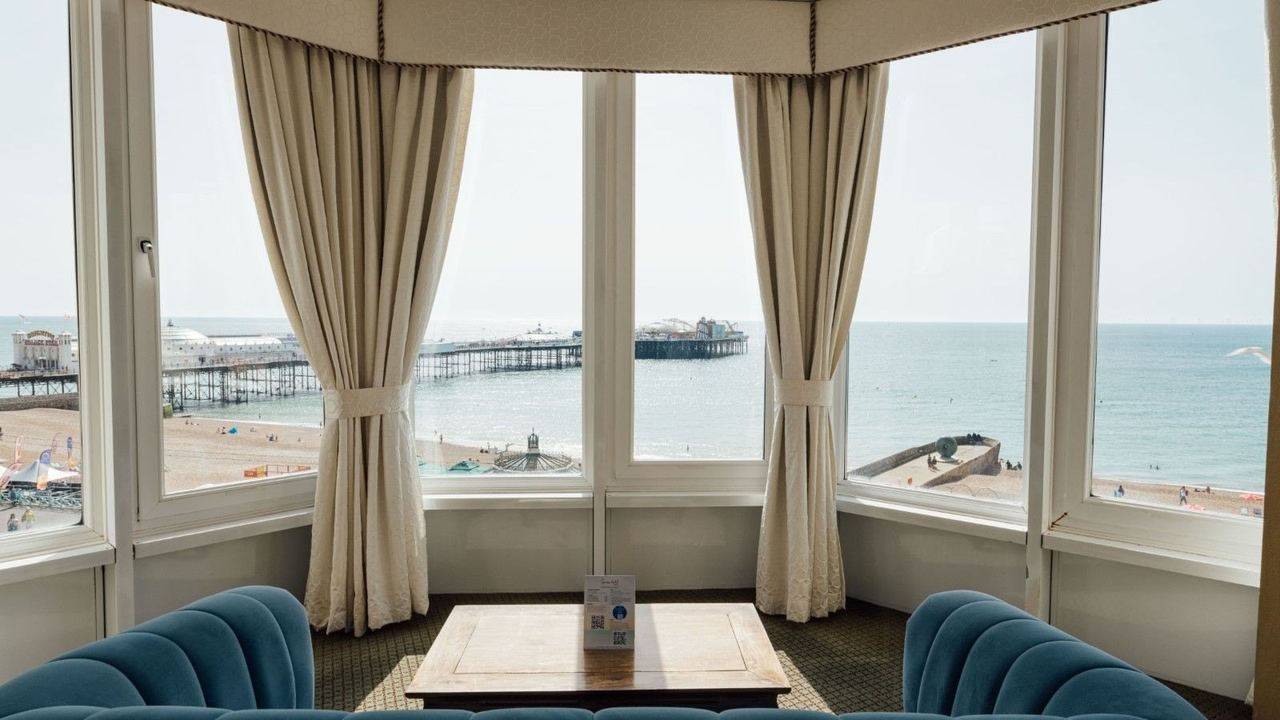A bay window seat at the Queens Hotel looking straight out to the sea and the Palace Pier