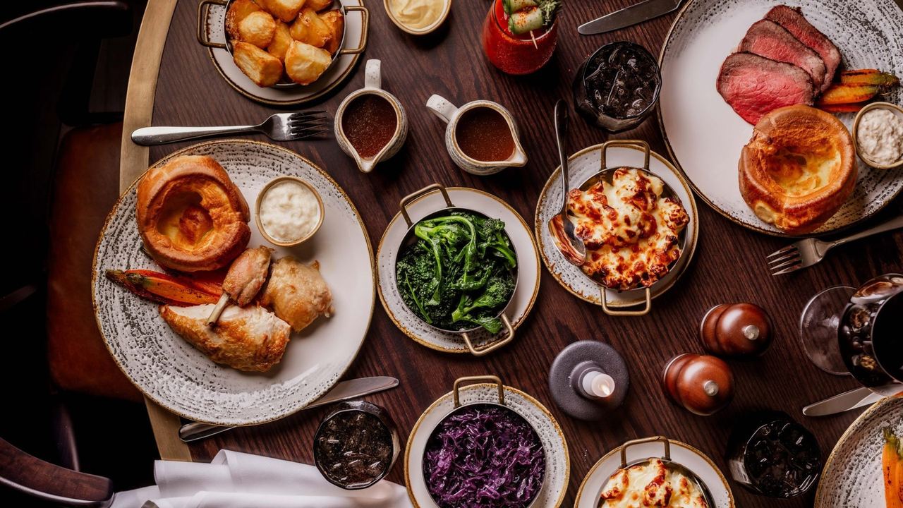 A Sunday roast with Yorkshire puddings and sides at Pearly Cow