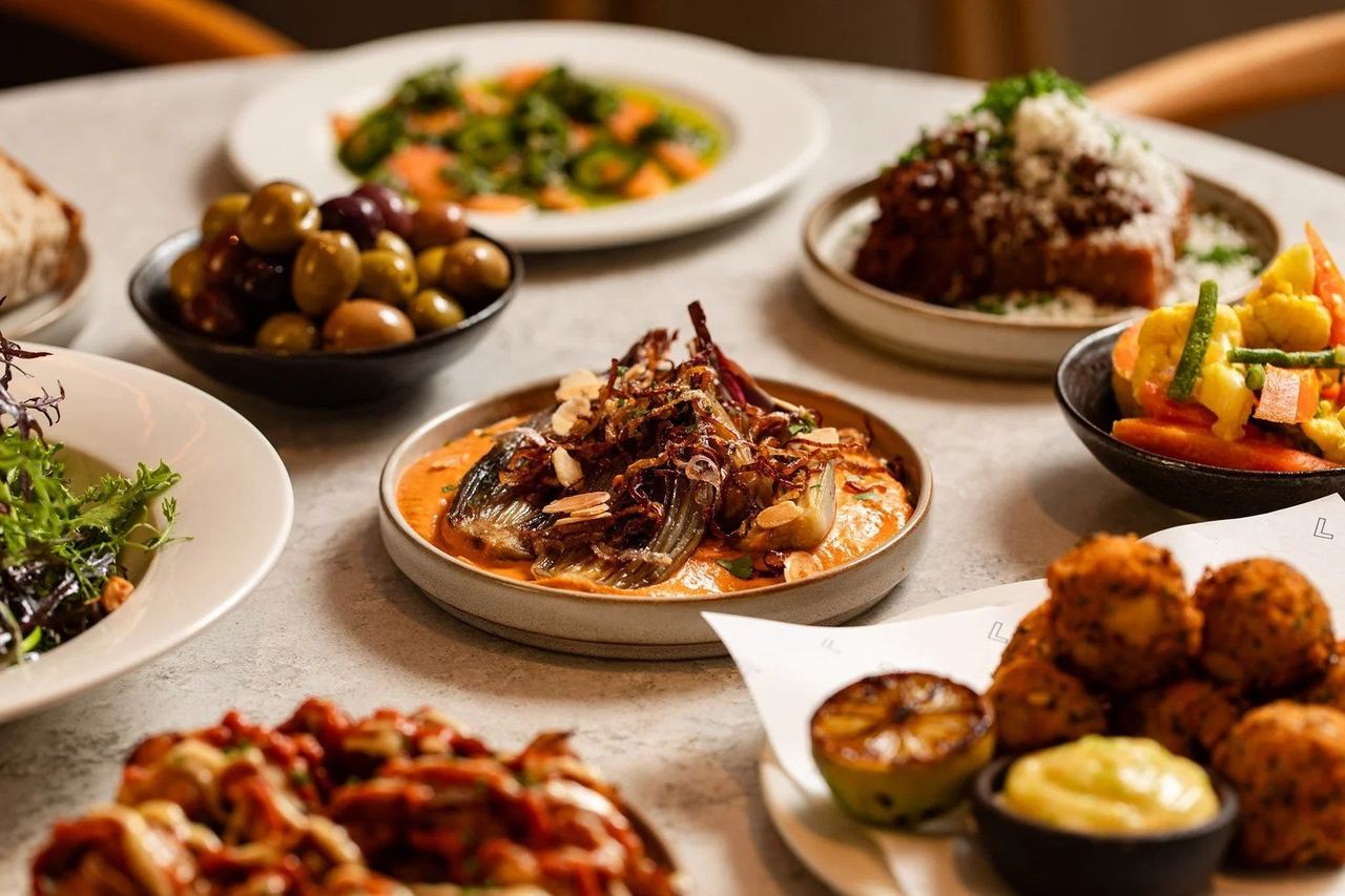Seasonal small plates on a table at Lost in the Lanes