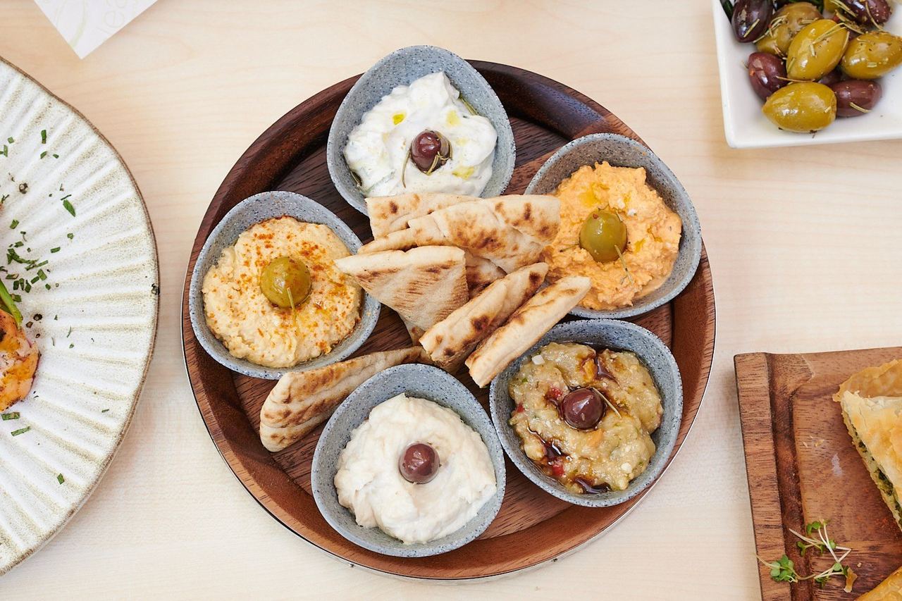 A board of Greek dips with pitta and olives at gr/eat Greek Cuisine